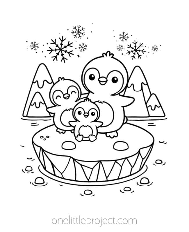 Three baby penguins on an icy drum in snow