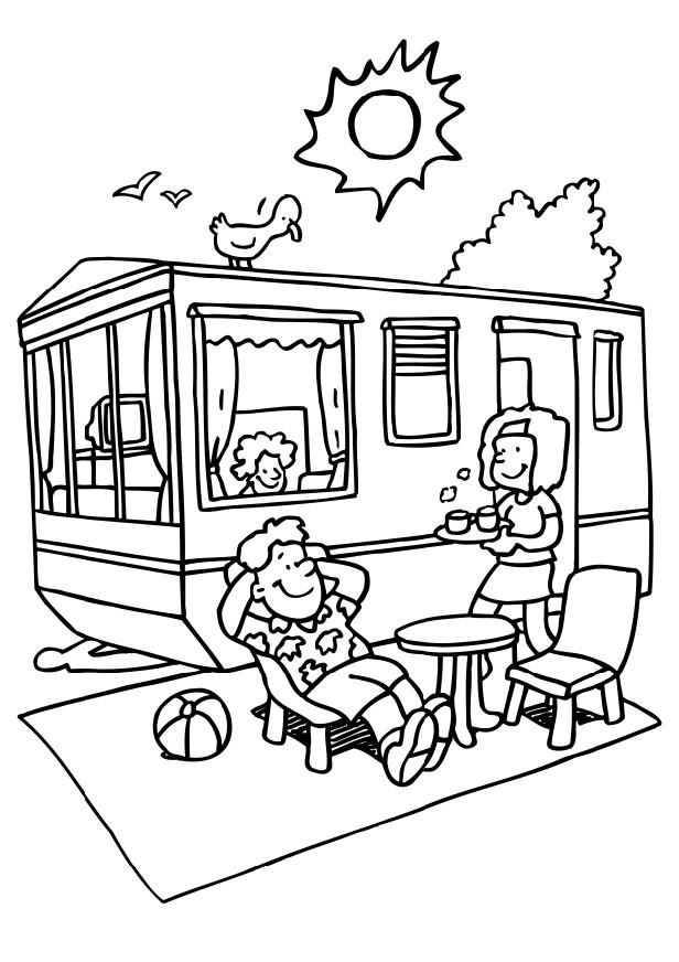Family relaxing beside a camper trailer outdoors