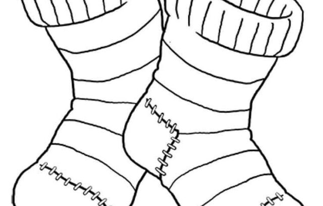 Two striped socks with stitched patches on white background