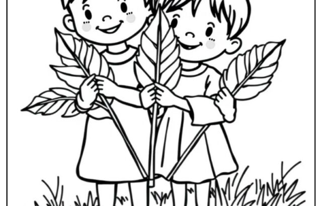 Two smiling children holding palm branches on grass