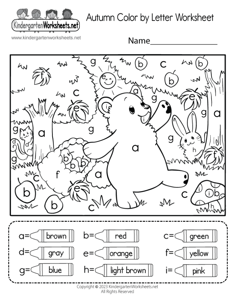 Autumn color-by-letter worksheet with bear and forest scene