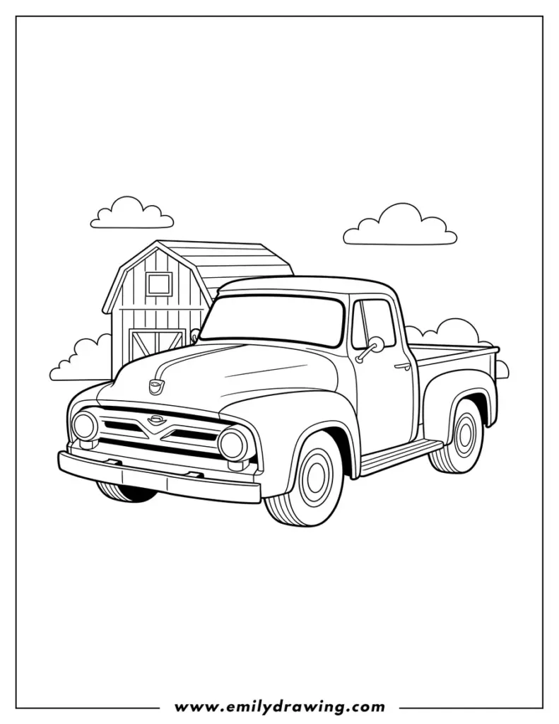 Vintage pickup truck in front of barn and clouds