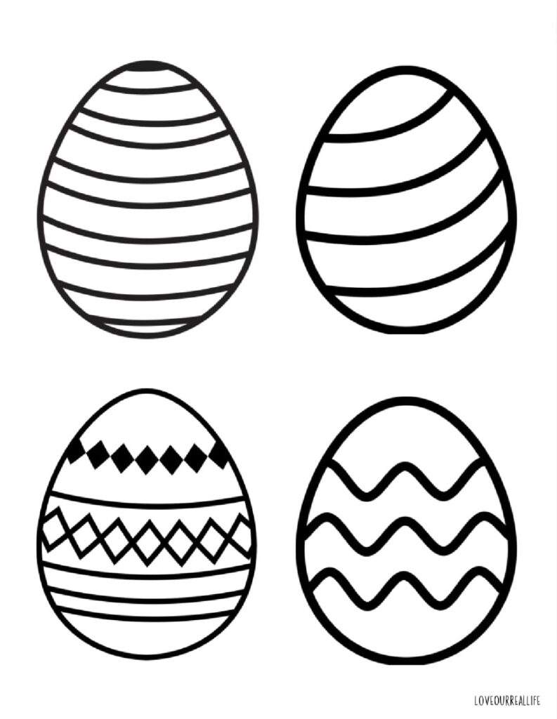 Four decorated Easter eggs on white background