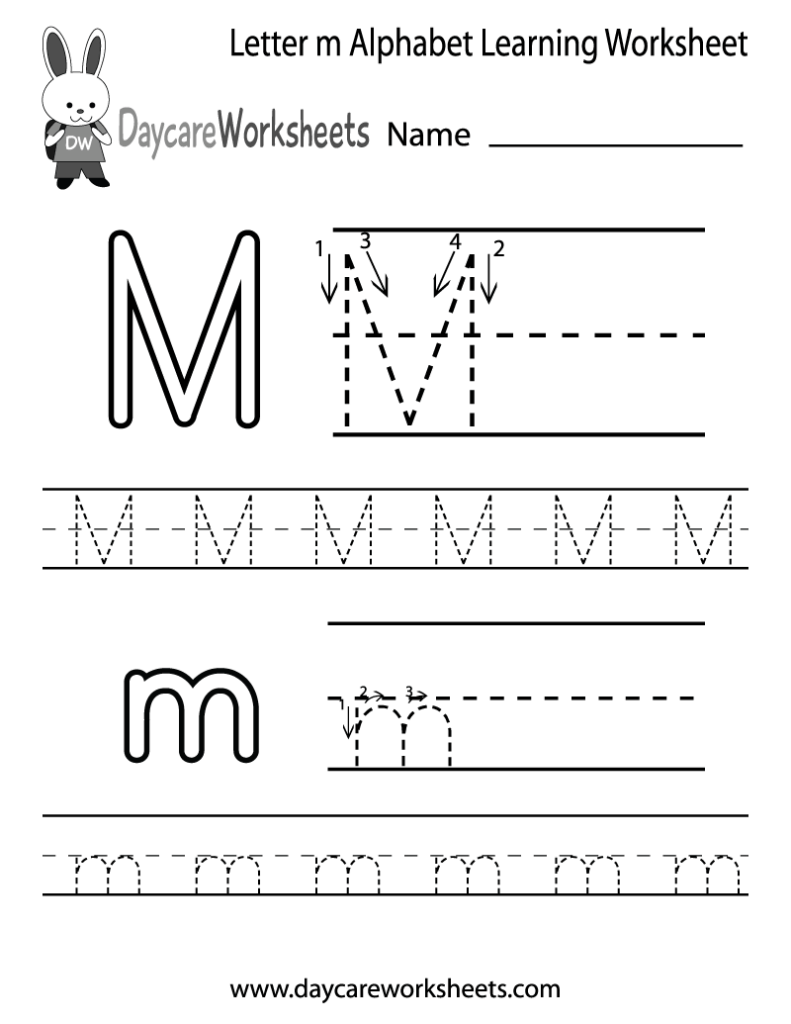 Letter M handwriting worksheet with tracing lines