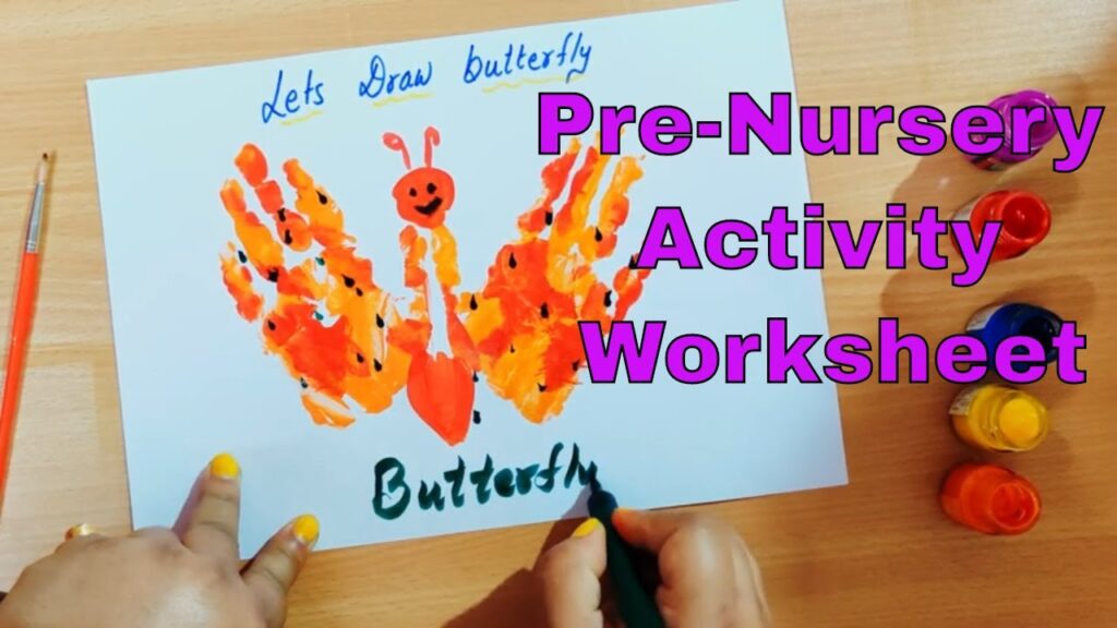 Child painting butterfly on worksheet with paint bottles and pen